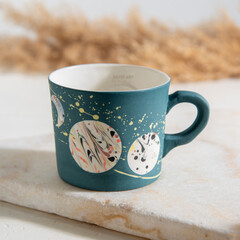 design blue ceramic coffee cup on marble table