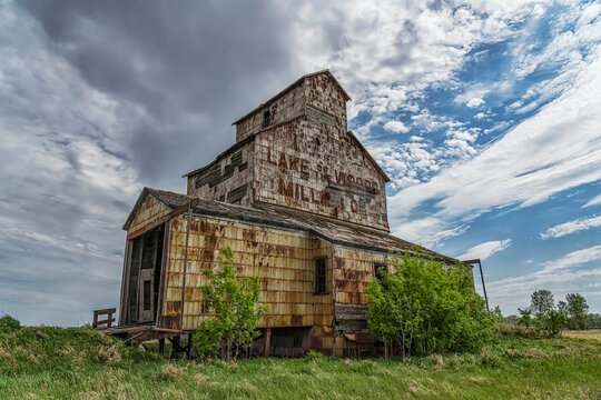 Weathered grain elevator on the prairies; Elva, Manitoba, Canada