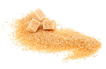 Crystals of cane sugar and brown sugar cubes isolated on a white background. Brown caramel cane...