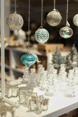 Colorful silver and turquoise green color Christmas balls festive decoration at store or shop 