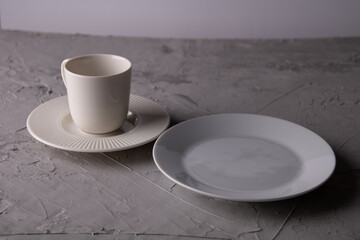 photo of an empty plate and mug