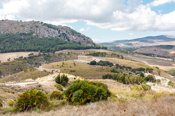 View at the Greek Doric temple in the Romantic hill landscape of Segesta, Sicily, Italy, Europe