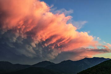 The incredible sunset seen from Valgioie (Valsangone, North-West of Italian Alps) on 7th August 2022. The clouds had unbelievable shapes and color tones. Valgioie, Piedmont, Italy