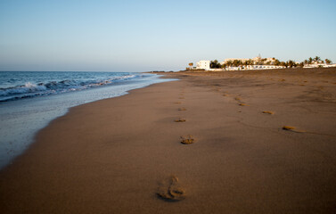 beach in the morning with Footsteps