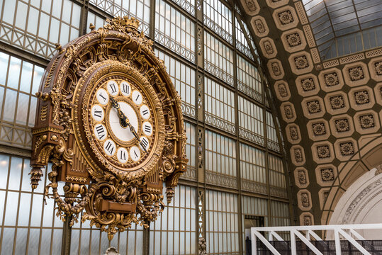 Ornate clock at the main hall of famous museum d'Orsay in Paris