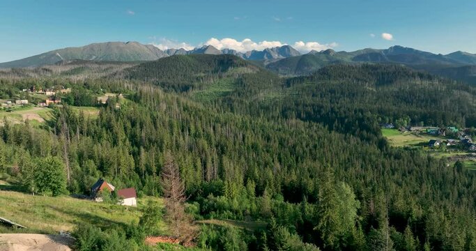 Aerial view of the Tatra Mountains. Drone flight over the Tatra Mountains with a view of the mountain peaks. High rocky mountains.