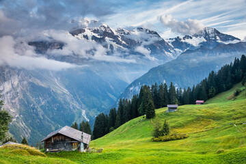 Fototapeta na wymiar Snowcapped Bernese Swiss alps and Murren village, Switzerland