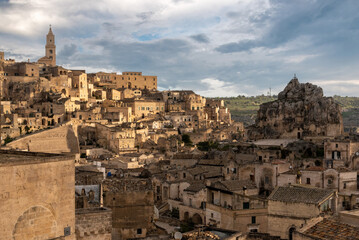 Scenic cityscape of Matera with the cave church Saint Mary of Idris, Southern Italy