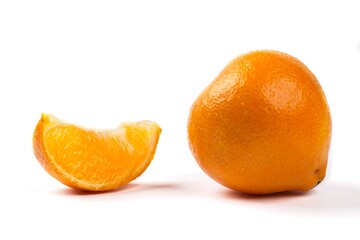 Whole orange and an orange slice.