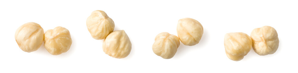 Peeled hazelnuts isolated on the white background, top view