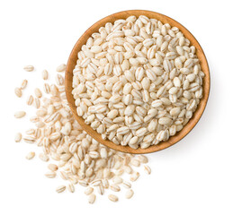 Highland barley in the wooden bowl, isolated on white background, top view.