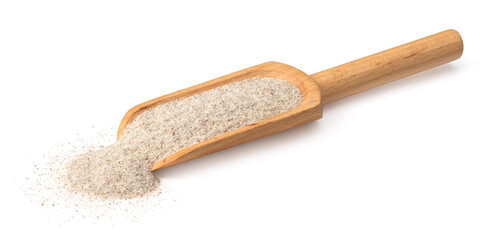 Raw rye flour in the wooden scoop, isolated on white background.