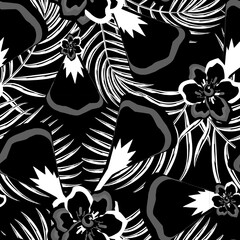 abstract vintage floral pattern with palm leaves on black background. fashionable prints teture. Floral background. Exotic wallpaper. tropical seamless background. interior decorative. Summer design