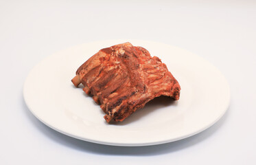 Fried pork ribs, barbecue, put in a white plate