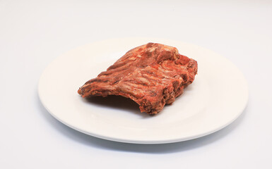Fried pork ribs, barbecue, put in a white plate