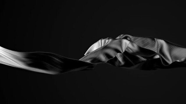 Silky cloth piece of fabric slowmo on dark
