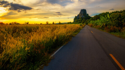 The road that leads to the rocky mountain in the natural attraction of Noen Maprang District.