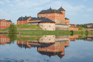 Naklejka na ściany i meble View of the ancient fortress of the Hameenlinna city on a July morning. Finland