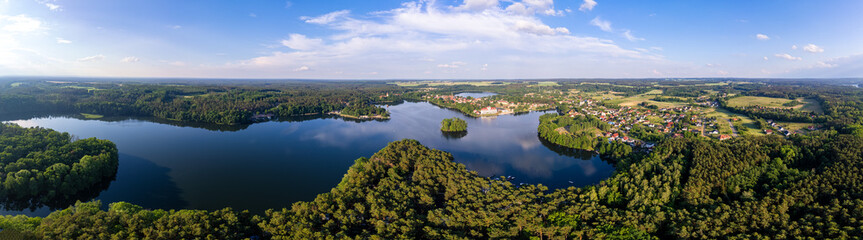 Fototapeta na wymiar Aerial shot of a beautiful lake in the summer day