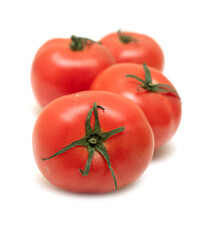 Red ripe tomato on a white background.