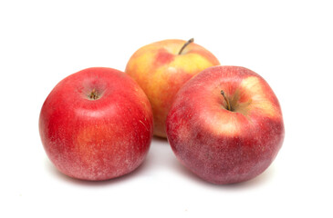 Fototapeta na wymiar Ripe apples on a white background.