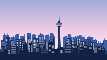 Panoramic silhouette of a city in the evening with tall buildings and the Petronas Tower
