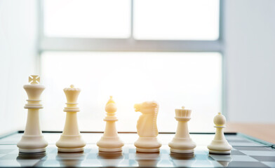 White chess pieces in a row