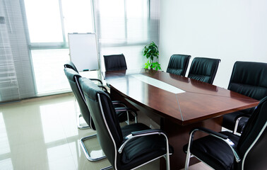 Empty conference room with table and chairs