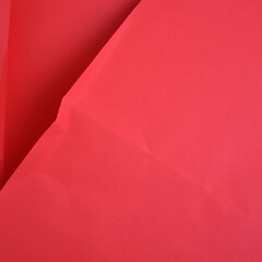 Red crumpled background paper texture. High quality background and copy space for text.