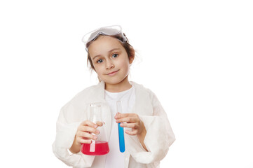 Happy smart little girl, primary school student, future chemist scientist in lab coat, holding test tube and lab flask, doing chemistry experiment, on white background. Profession and science concept