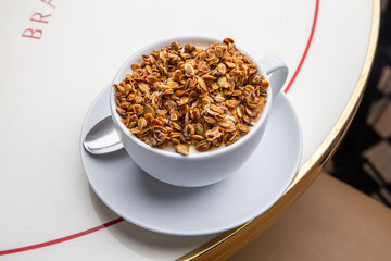 Granola with yogurt in a cup