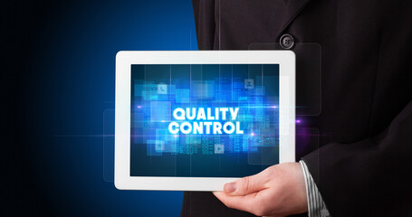 Person holding tablet, technology concept