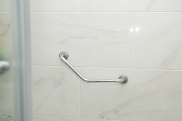handrail in the shower, safe bathing for the elderly and people with limited mobility