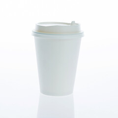 Paper cup with cap isolated on white background