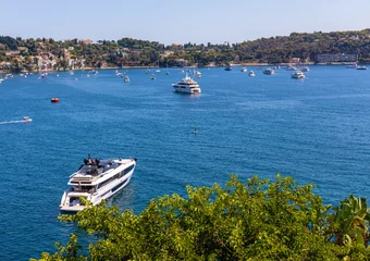 Cercles muraux Villefranche-sur-Mer, Côte d’Azur Panoramic view of harbor and yachts offshore Azure Cost of Mediterranean Sea in Villefranche-sur-Mer resort town in France