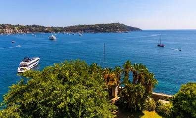 Cercles muraux Villefranche-sur-Mer, Côte d’Azur Panoramic view of harbor and yachts offshore Azure Cost of Mediterranean Sea in Villefranche-sur-Mer resort town in France