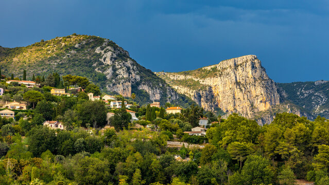 Panoramic view of Alps mountains chain with Baou des Blancs rocky peak north of La Lubiane river valley seen from historic old town of Vance town in France