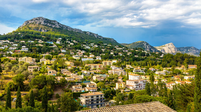 Panoramic view of Alps mountains chain with Baou des Blancs rocky peak north of La Lubiane river valley seen from historic old town of Vance town in France