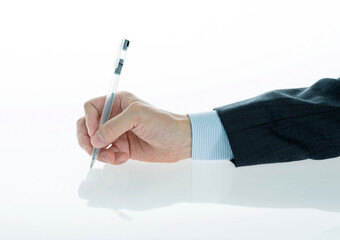 Businessman hand holding a pen on white background