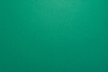 Panorama de fond uni en papier vert pour création d'arrière plan.