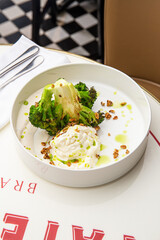 Baked broccoli with sauce and chilli