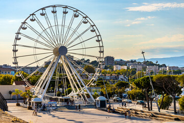 Grand Ferris Wheel Grande Roue at Esplanade du Pre des Pecheurs promenade in Vauban Port and yacht...
