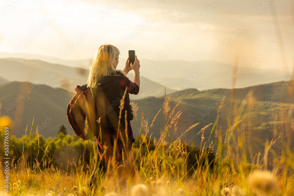 Canvas Prints Happy woman on the sunset in nature in summer