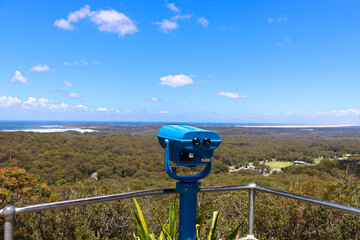 Gan Gan lookout with blue tourist binocular on a sunny blue sky day