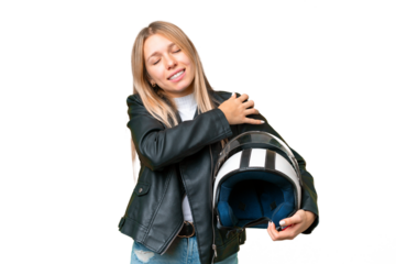 Young pretty blonde woman with a motorcycle helmet over isolated chroma key background suffering from pain in shoulder for having made an effort