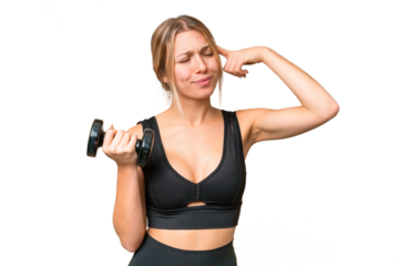 Blonde sport woman making weightlifting over isolated chroma key background having doubts and with confuse face expression
