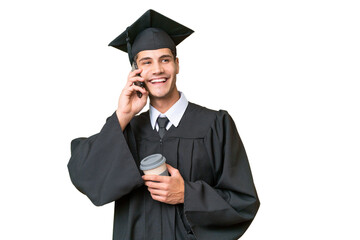 Young university graduate caucasian man over isolated background holding coffee to take away and a mobile