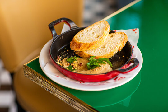 Chicken liver pate with bread and herbs