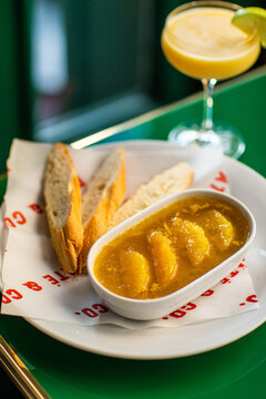 Chicken pate with orange and bread with cocktail