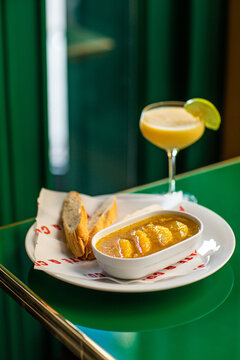 Chicken pate with orange and bread with cocktail
